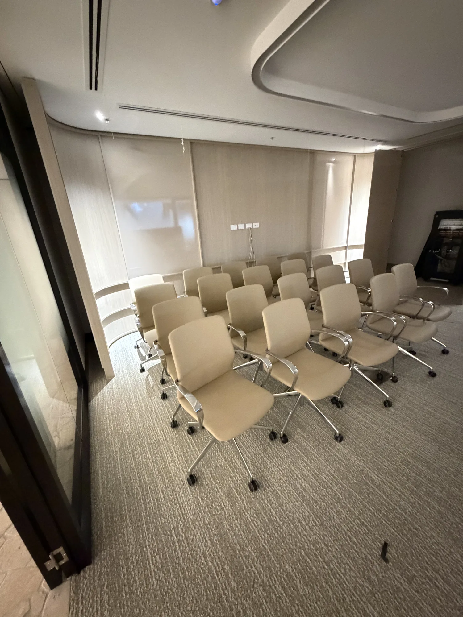 Meeting-room chairs arranged by LOG Transport in a premium commercial fitout